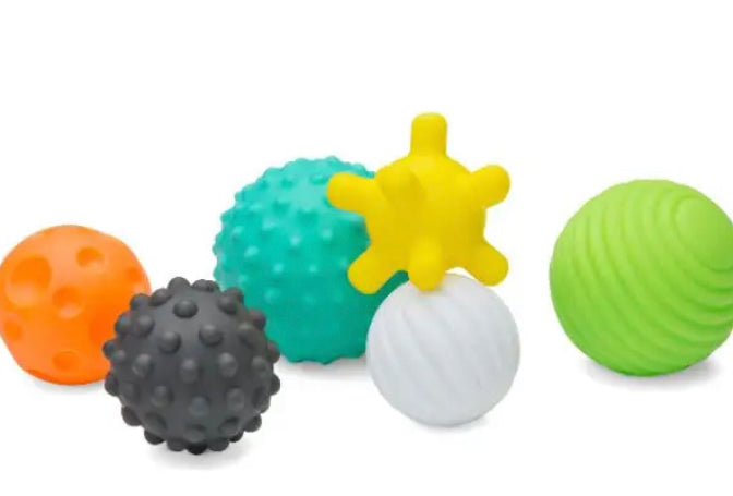 Taktil stimuli, tekstur (knopper, fordybninger, riller) 